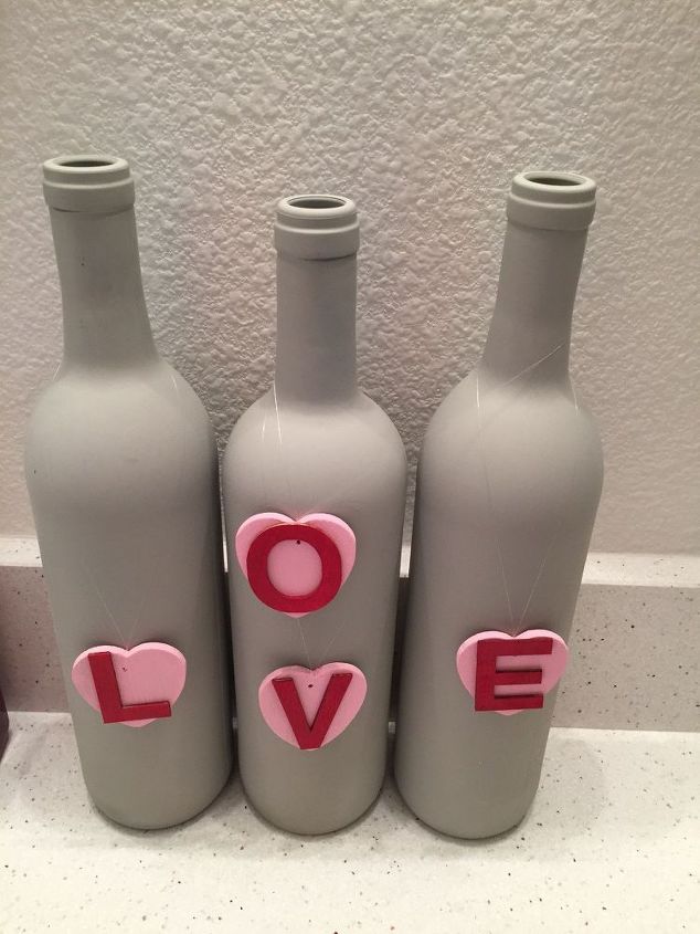 up cycled wine bottles for holiday decorations, Here I am using them to Valentines Day