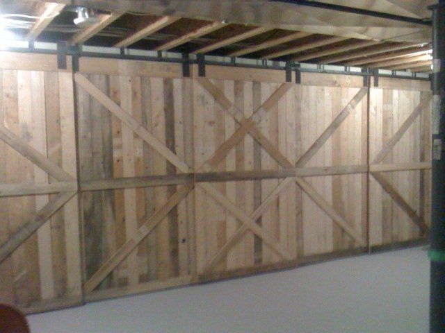 q rolling barn door made from scrap pallet wood, doors, outdoor living, pallet