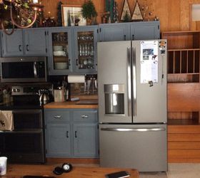 q what color should i paint cabinet tall teak cabinet on right, kitchen cabinets, kitchen design