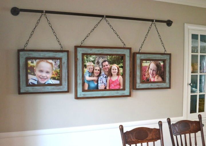 s show off your family photos with these 16 creative ideas, Or hang a few off a rustic iron pipe