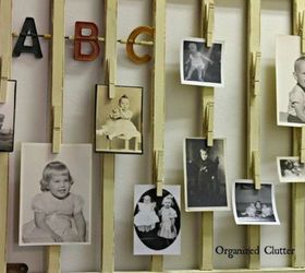s show off your family photos with these 16 creative ideas, Clip them onto an old crib rail