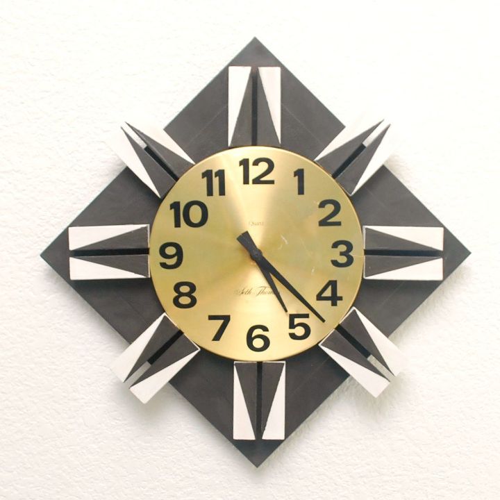 reloj de mediados de siglo con forma de estrella