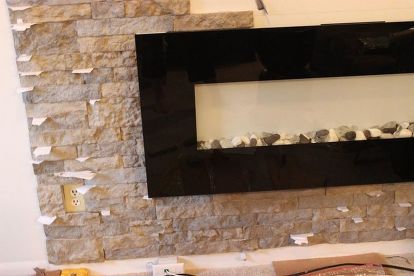 You Might Want To Some Airstone At Lowe S When See What This Diy Airstone Veneer Stone Accent Wall Concrete Masonry Home Decor
