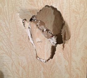 how do i cover a hole on a wallpapered wall