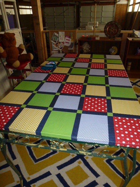 scrapbook papers become quilted tabletop