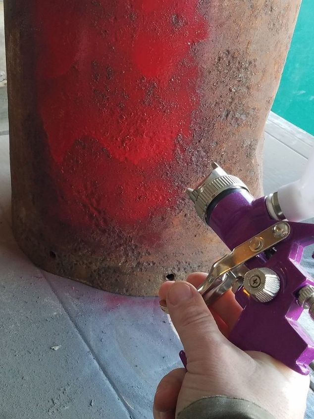 repurposing vintage milk can to a side table