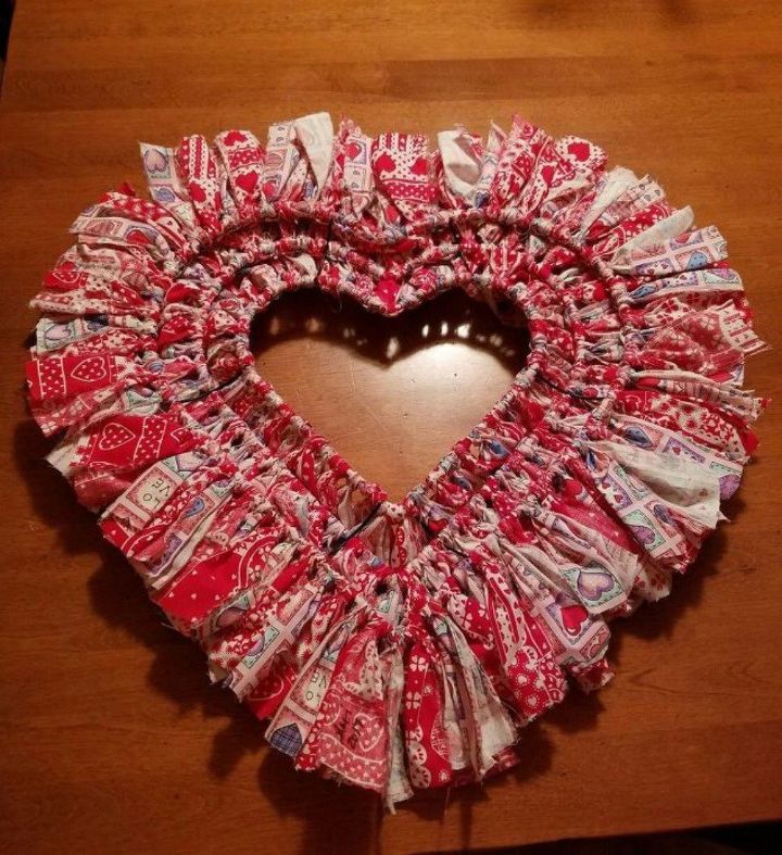 s dress your door for valentine s with these 20 beautiful wreaths, crafts, doors, seasonal holiday decor, valentines day ideas, wreaths, This heart one made from a rags
