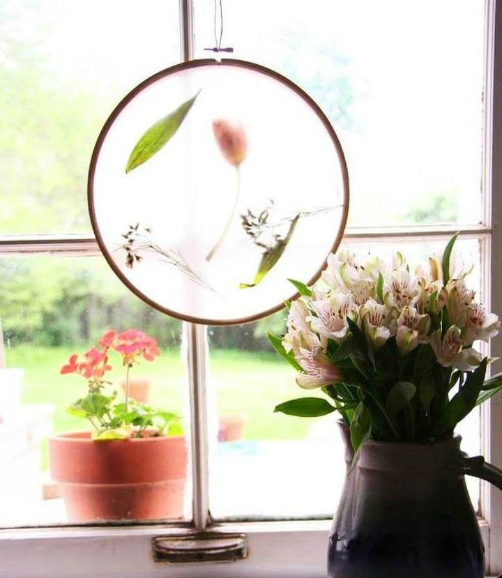 15 ultimate ways to use embroidery hoops in your home decor, Transform it into an elegant sun catcher