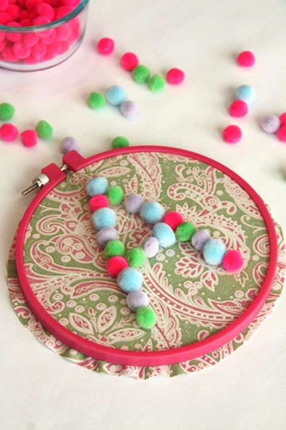15 ultimate ways to use embroidery hoops in your home decor, Fashion it into decor for a girl s room