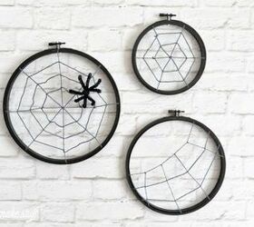 15 ultimate ways to use embroidery hoops in your home decor, Use it as spidery decor for Halloween