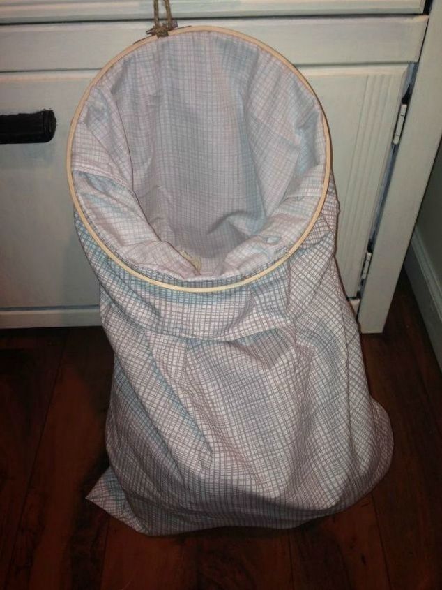 15 ultimate ways to use embroidery hoops in your home decor, Repurpose it as a laundry bag frame