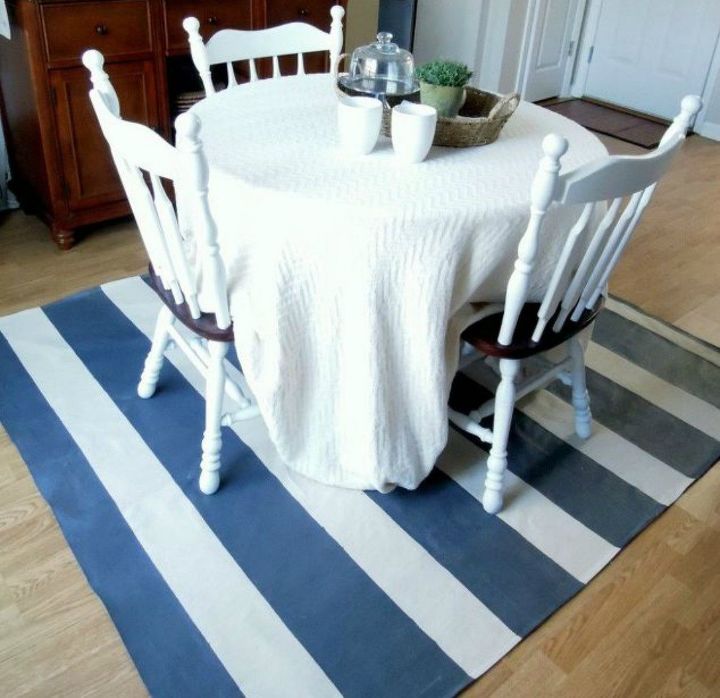 11 gorgeous reasons to try fabric in your kitchen decor, As a cute rug underneath your breakfast table