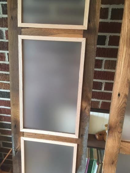 we built double sliding barn style doors for bathroom