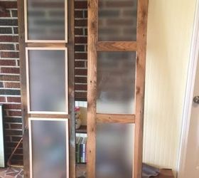 we built double sliding barn style doors for bathroom