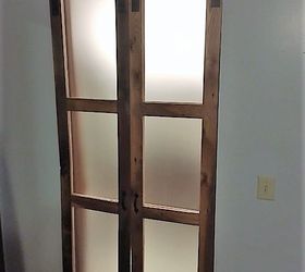 we built double sliding barn style doors for bathroom