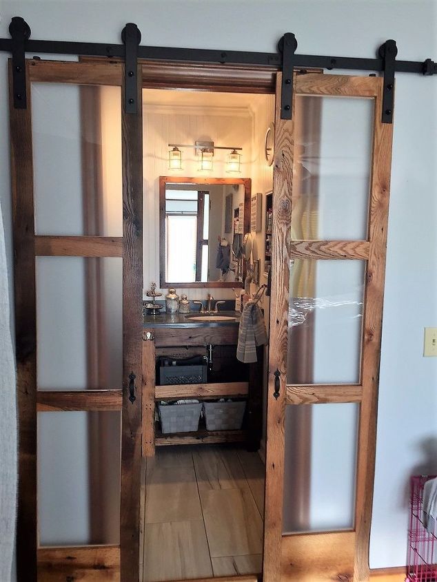we built double sliding barn style doors for bathroom