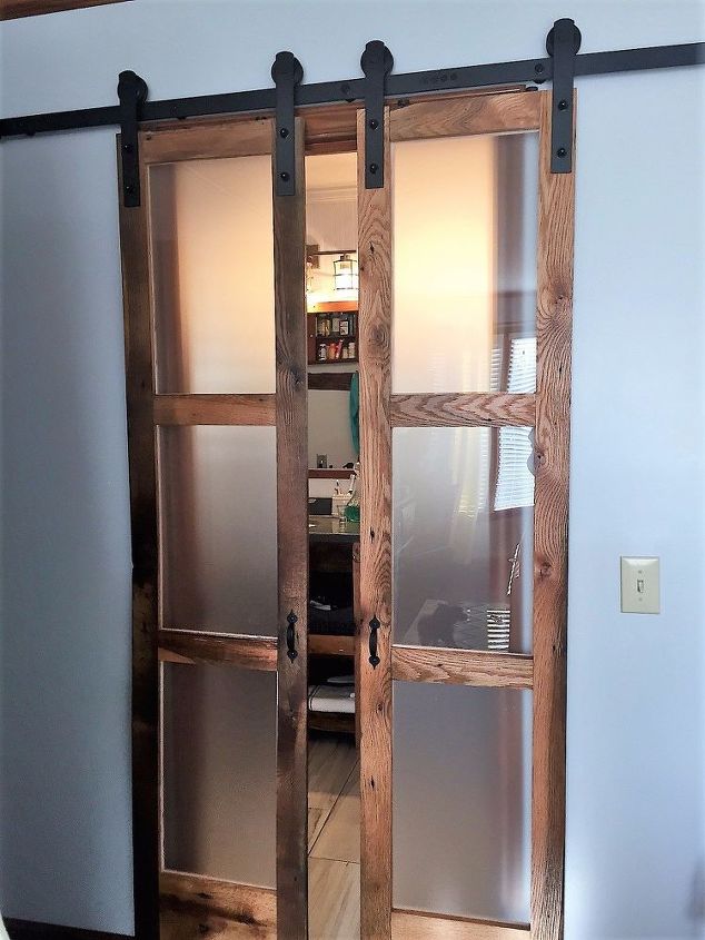 we built double sliding barn style doors for bathroom