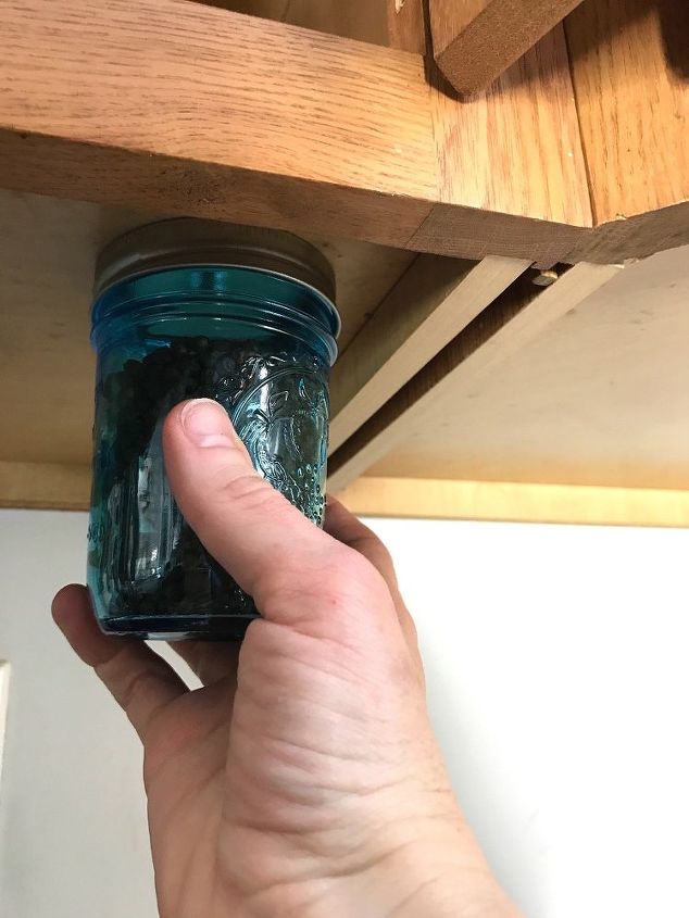 mounted mason jar spice storage