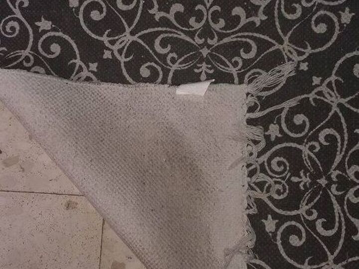 q how can i keep my hallway rug in place, foyer, reupholster