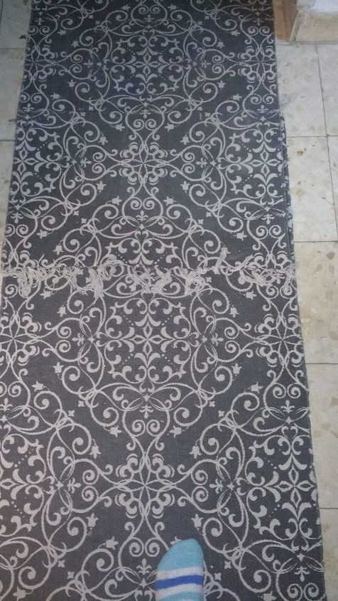 q how can i keep my hallway rug in place, foyer, reupholster