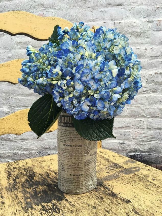 14 stunning ways to add cement to your home decor, Turn it into a vintage flower vase