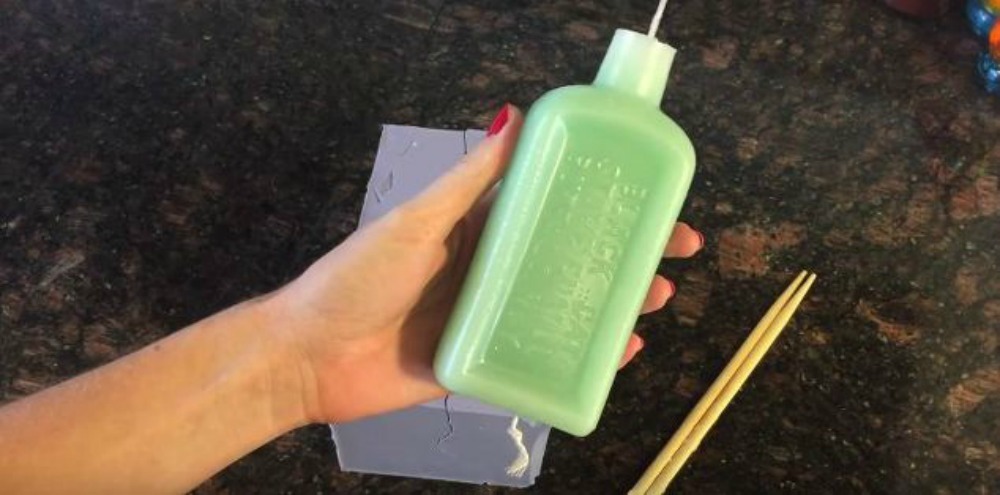 s 15 gorgeous homemade candle ideas you re going to want to try, These cool vintage bottle candles