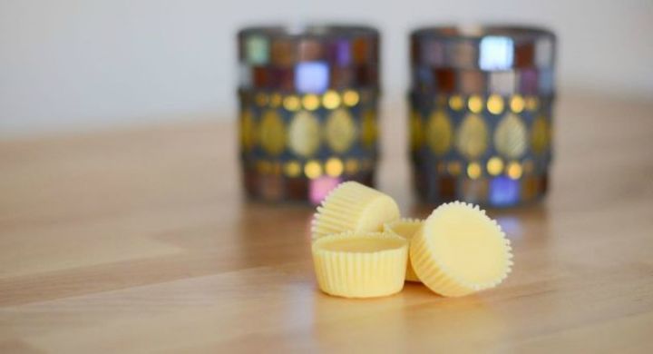 15 gorgeous homemade candle ideas you re going to want to try, These adorable buttercup candles