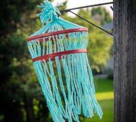 s yarn bomb your home with these 18 adorable ideas, home decor, String it into an outdoor tree hanger