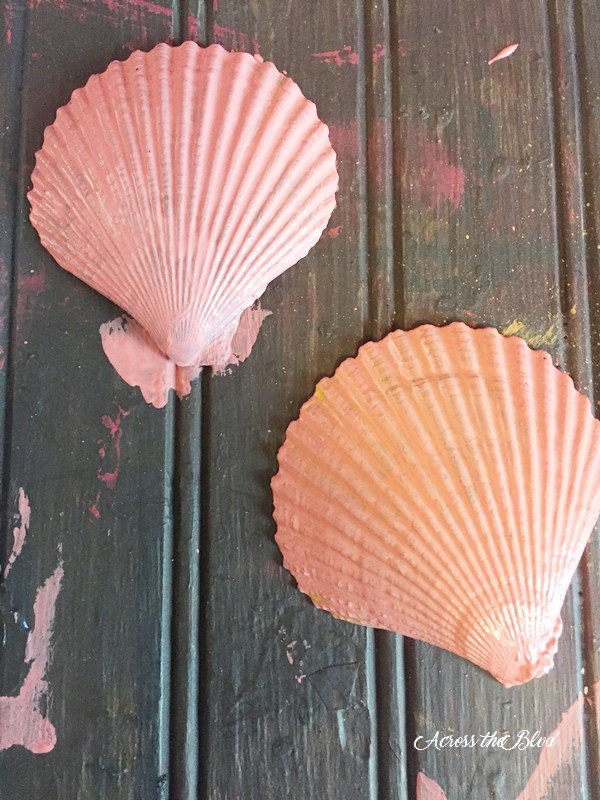 servilleteros de conchas marinas y paisaje de mesa costero