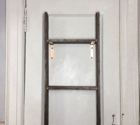 She nails a ladder to the back of her door to double her storage space