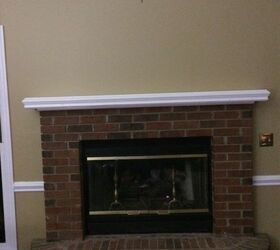 i love my updated brick fireplace, concrete masonry, fireplaces mantels, Old fireplace with decor removed