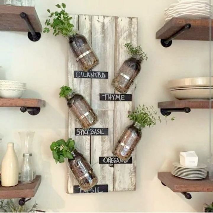 s get rid of kitchen countertop clutter with 13 clever mason jar ideas, countertops, kitchen design, mason jars, organizing, Or mount that herb garden on your wall