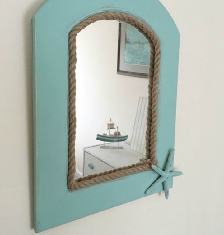 s 15 easy tricks to give your furniture that gorgeous distressed look, painted furniture, Turn a coastal mirror shabby with a sander
