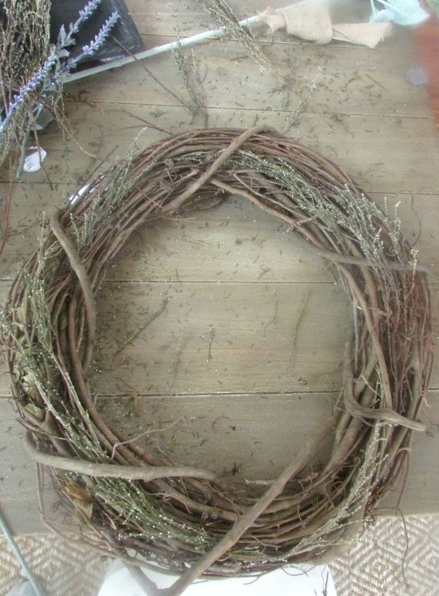easy diy spring wreath, crafts, wreaths, Adding the dried flowers to the wreath