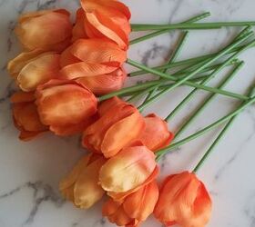 Bunch together orange flowers for this ridiculously cute front door idea