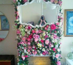 tired of wreaths here are 11 cute ways to decorate with faux flowers, Create a secret garden like fireplace facade