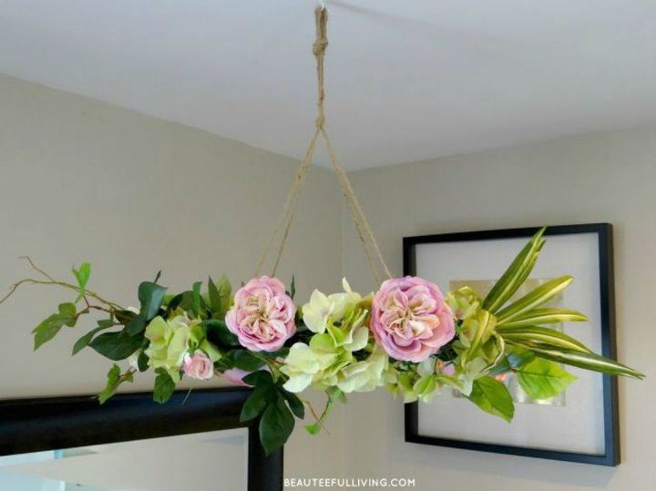 tired of wreaths here are 11 cute ways to decorate with faux flowers, Hang a wreath form as a floral chandelier