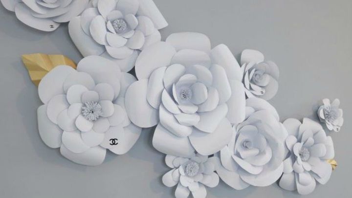 tired of wreaths here are 11 cute ways to decorate with faux flowers, Embellish your closet with paper flowers