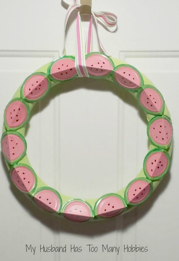 s 14 awesome things you didn t know you could do with jar and tin lids, Bend them into a watermelon wreath