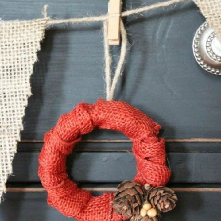 s 14 awesome things you didn t know you could do with jar and tin lids, Wrap them into a mini fall wreath garland