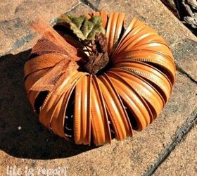 s 14 awesome things you didn t know you could do with jar and tin lids, Turn your canning lids into a pumpkin
