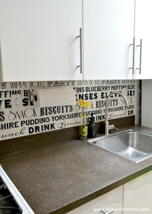 s 14 sneaky ways to fake a high end look with contact paper, Update your backsplash with a removable print