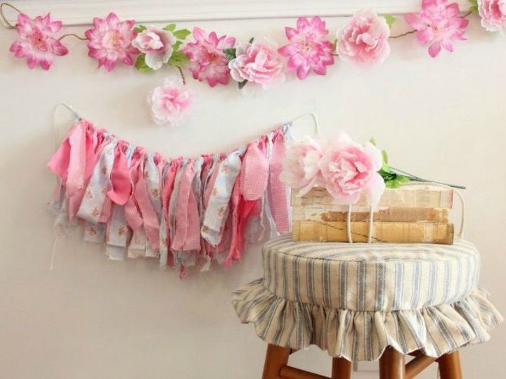 s no way these pops of color were made with dollar store items, This stunning card stock garland