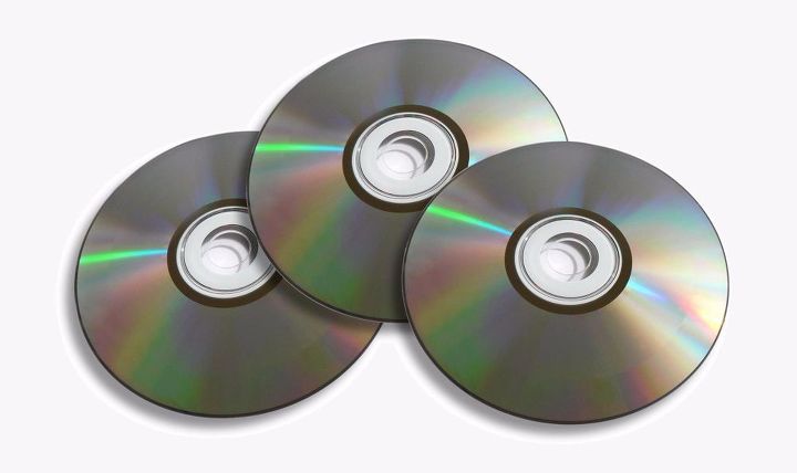 quick candle holders diy reciclaje de cd y kawa cups, Necesitas un DVD