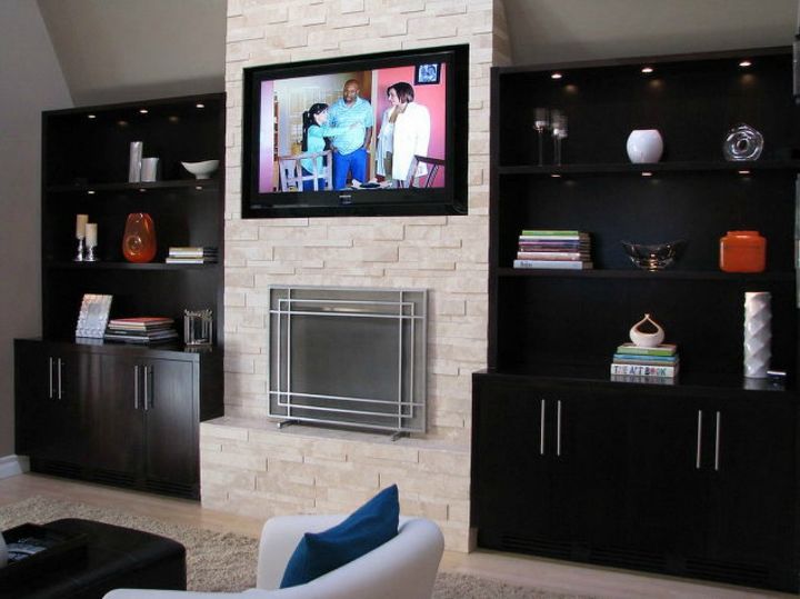 s 11 impressive ways to update your home with stone, concrete masonry, home decor, Turn your fireplace into a modern center