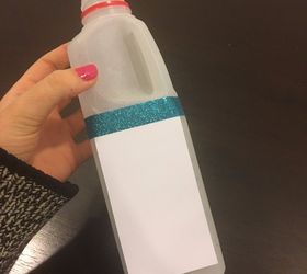 milk jug turned into a watering can