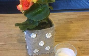  Uma caixa de leite transformada em um vaso de flores