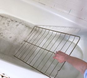 cleaning oven racks in the bathtub