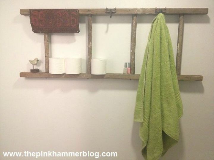 replace your bathroom shelves with these 13 creative ideas, Turn an old ladder on its side