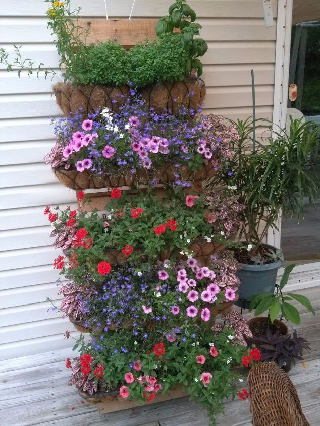15 Amazing Flower Tower and Tipsy Pot Planters You Can Build- These DIY flower towers and tipsy pot planters are stunning ways to add vertical interest to your garden, porch, or front entry! | #tipsyPot #flowerTower #DIY #gardening #ACultivatedNest